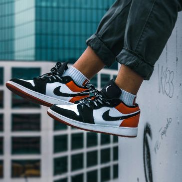 Person wearing Nike Air Jordan sneakers.