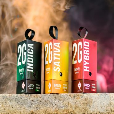 Three colorful 2G cannabis product boxes labeled Indica, Sativa, and Hybrid at our Denver weed store best dispensary Denver.