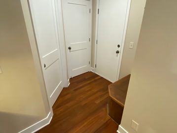 Hallway and doors painted by Thompson Quality Painting, painters near me interior painting services
