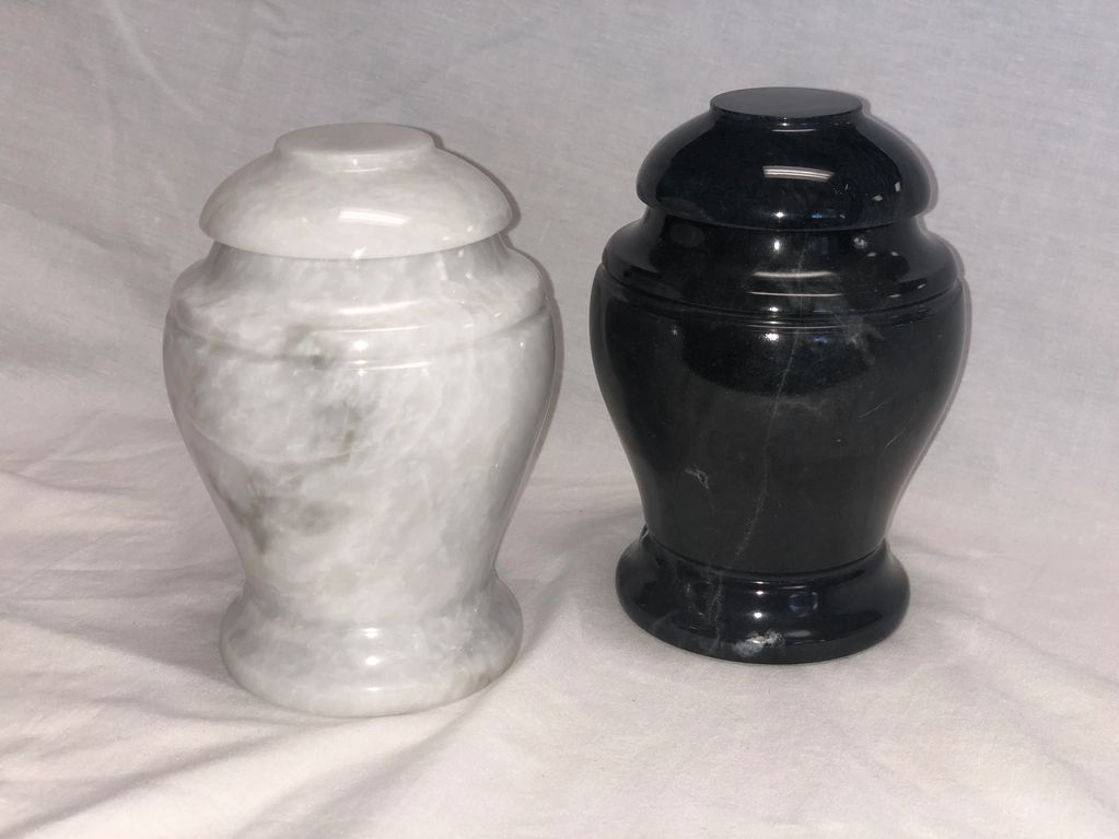Black or white marble urn.