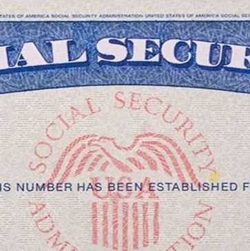 Close-up of a U.S. Social Security card with blue and red design.