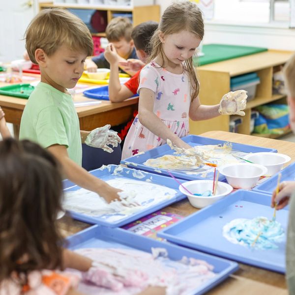 Pre-K students discover kinaesthetic hands-on learning with shaving cream art.