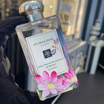 Jo Malone bottle hand painted with pink daisies and dragonflies