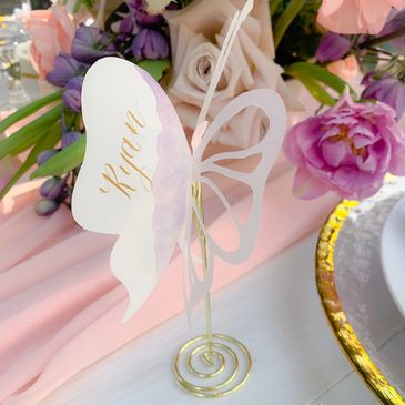 Hand cut and painted butterfly shaped place card with gold lettering