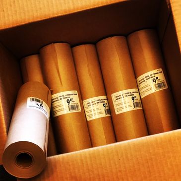 Box with rolls of general purpose masking paper, 9 inches wide.