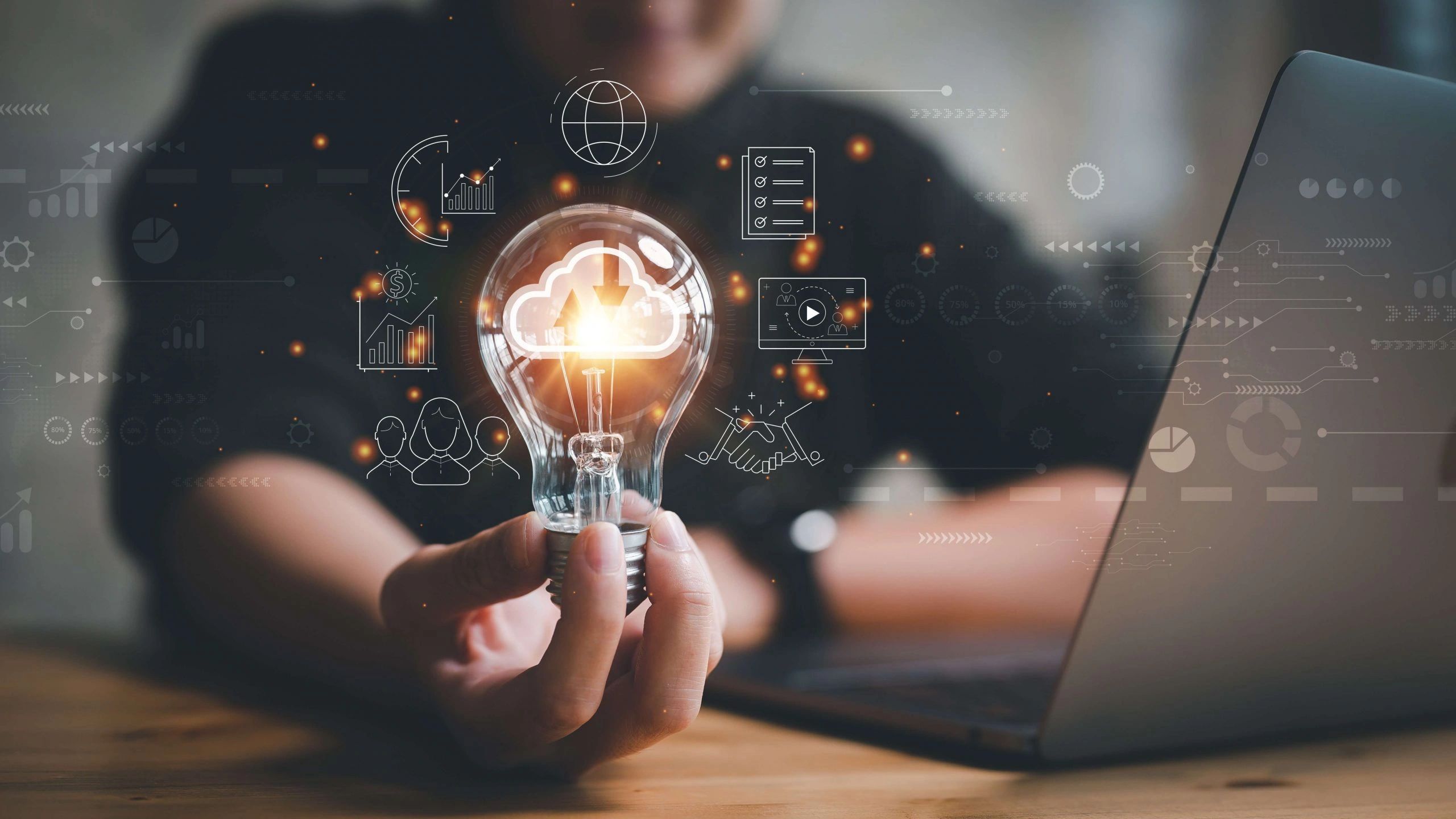 A light bulb and PC surrounded by technical images symbolize bright ideas in technical writing.
