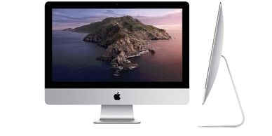 image of an Apple iMac computer with a view of a mountainous island on the screen
