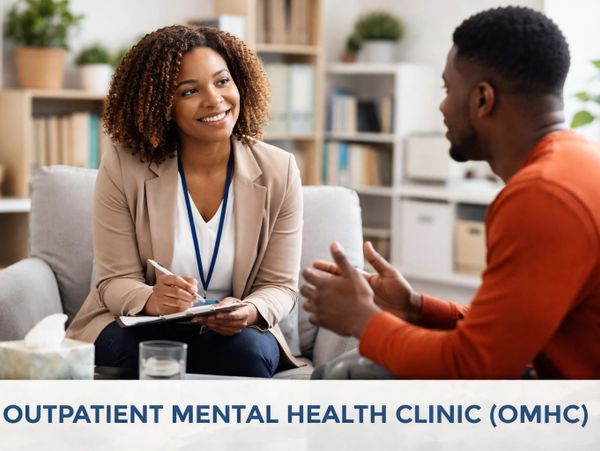 Therapist and patient in a positive outpatient mental health clinic session.