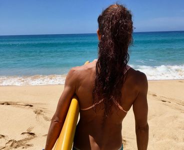 Pilates muscle development, surfing lifestyle, Kauai, serenity