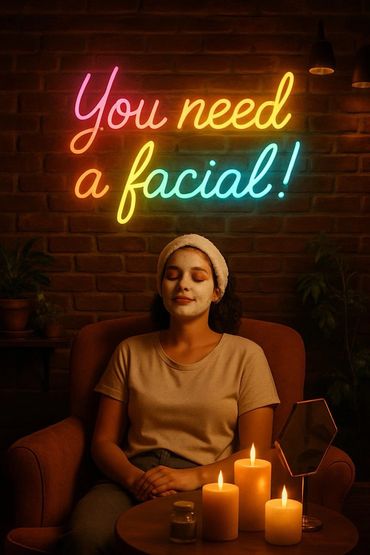 Woman relaxing with a facial mask under neon sign and candlelight. You need a facial!