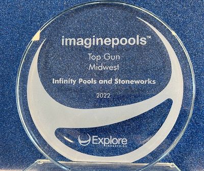 Glass award for Top Gun Midwest by imaginepools in 2022 from Infinity Pools and Stoneworks.