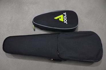 Two black cases one with a full violin and one with the 3d printed portable violin