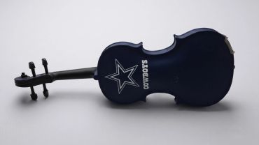 Dark blue 3D printed violin with Dallas Cowboys logo and text.
