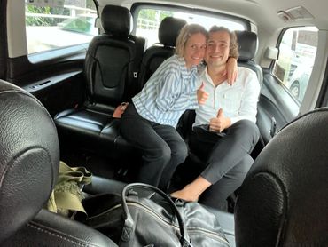 Happy couple in maxicab