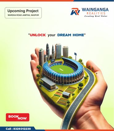 Hand holding a miniature city with stadium and buildings for real estate promotion.