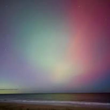 Colorful aurora over the horizon.
