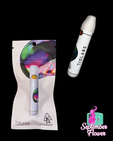 710Labs live rosin vape pen and packaging against black background.