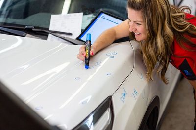 In house auto adjusters for auto hail repair estimates