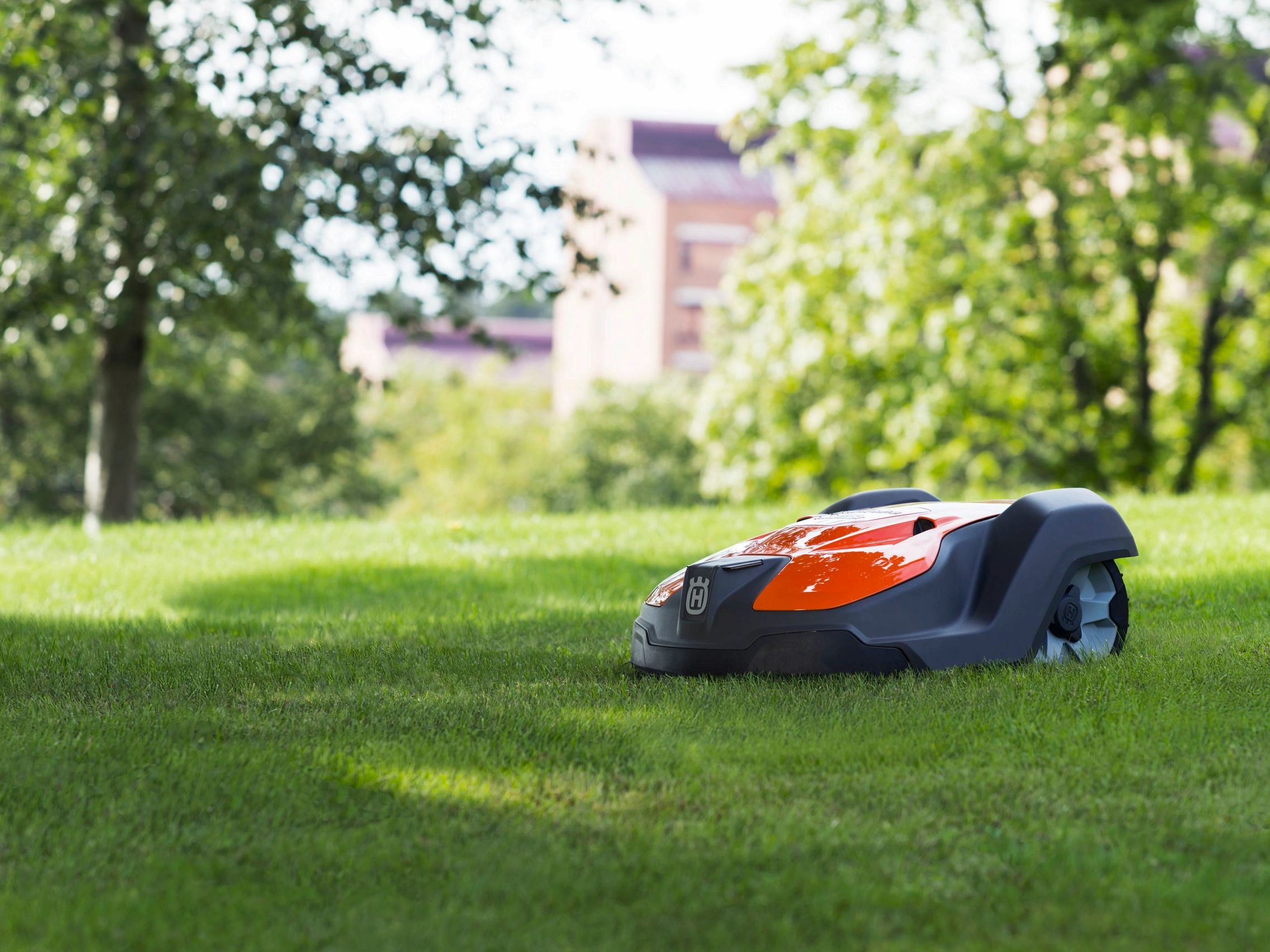 An Automower providing lawn care service and keeping the grass perfectly green