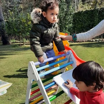 White colorful rainbow wood pikler triangle climbing frame
