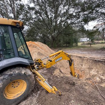 backhoe tractor deere tree work