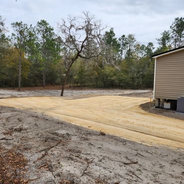 lime rock driveway fill dirt new home pad backhoe