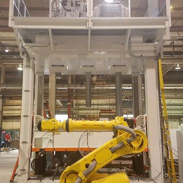 hydraulic press and FANUC automated arm