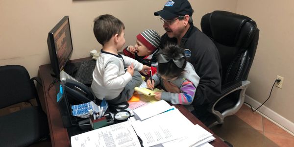 Mike with his grandkids