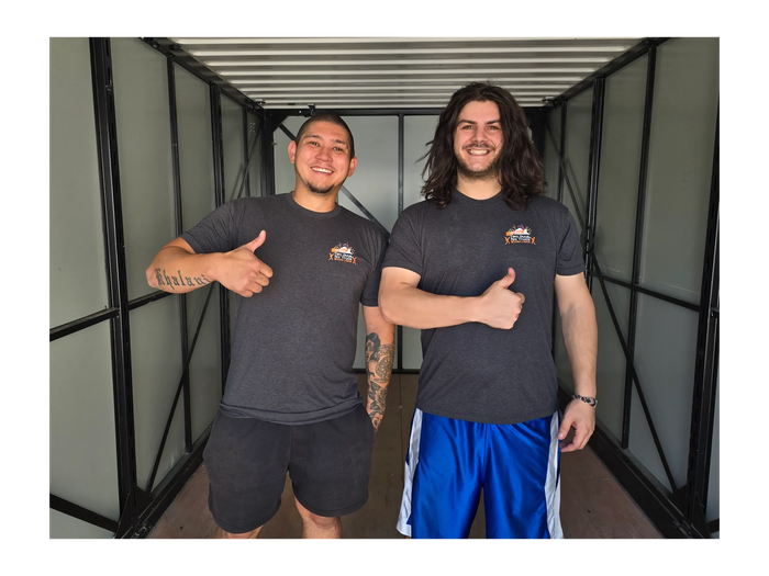 Movers unloading a POD