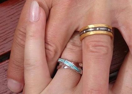 Mark and Dee holding hands