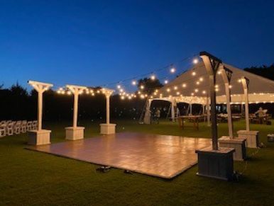 cafe bulb lighting over outdoor dance floor