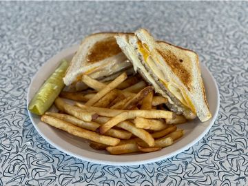Grilled cheese sandwich with fries