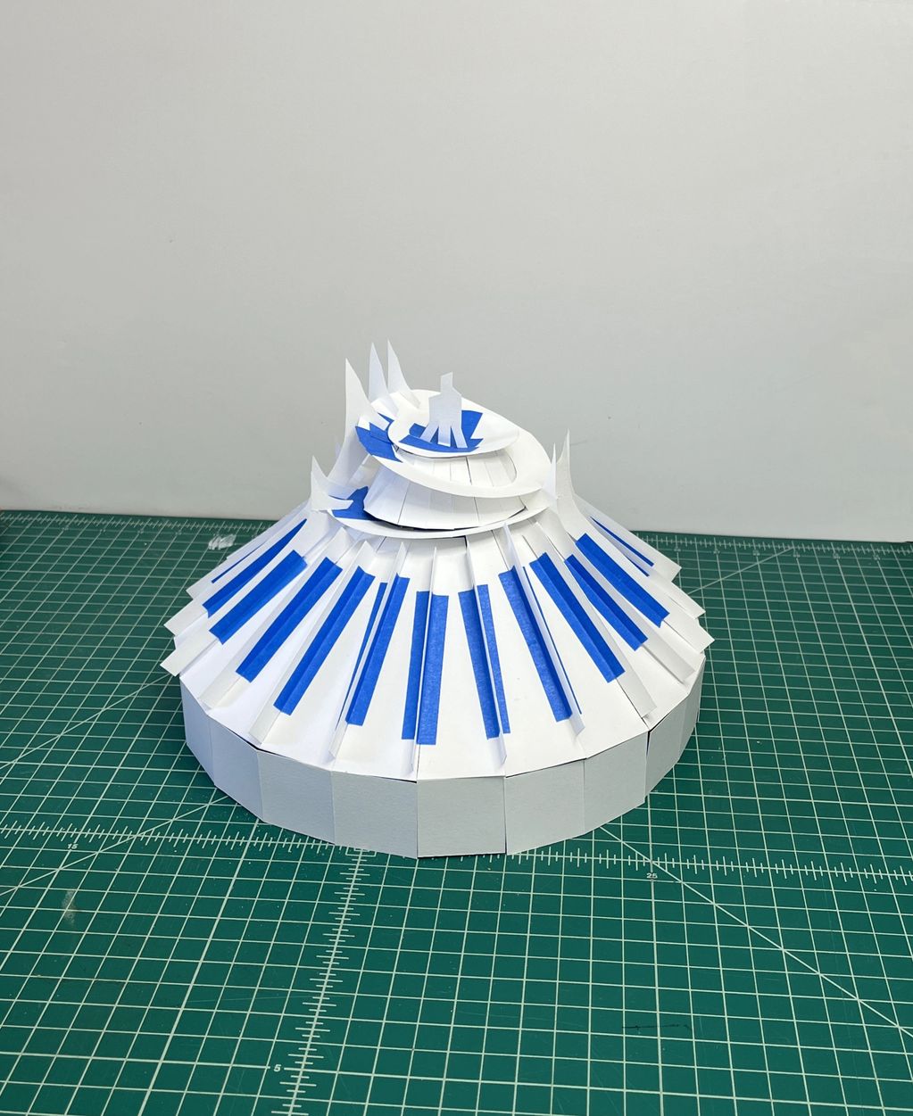 Paper model resembling a stairs or spiral structure.