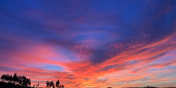 Sunset over the hills of the Alentejo valley at a Portugal wine retreat
