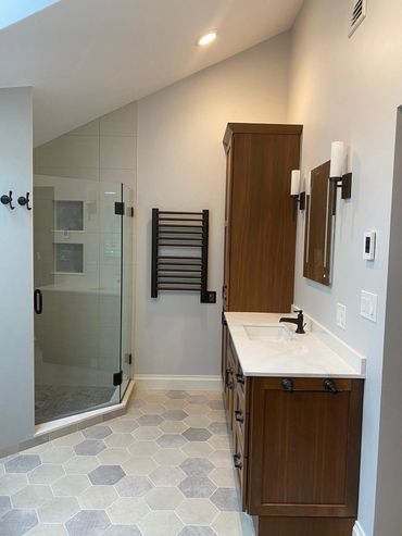 Fixtures from Brizo finishing venetian bronce. Tub from Fleurco Opus Verisimo. Toilet wallmont from Toto