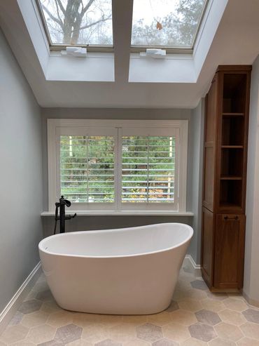 Fixtures from Brizo finishing venetian bronce. Tub from Fleurco Opus Verisimo. Toilet wallmont from Toto