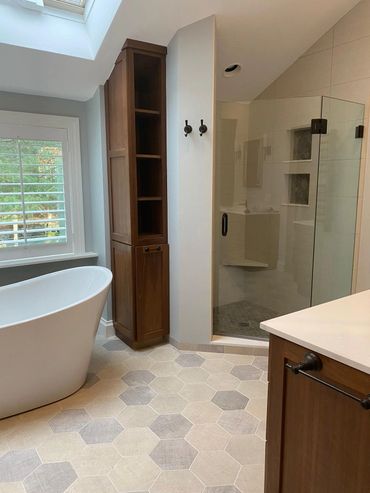 Fixtures from Brizo finishing venetian bronce. Tub from Fleurco Opus Verisimo. Toilet wallmont from Toto