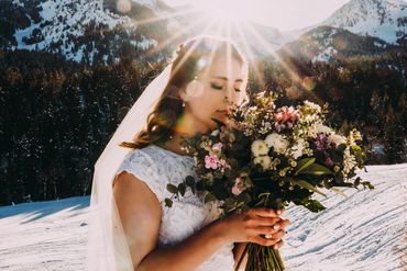 Stunning Beautiful bridal picture taken in Provo Canyon, Utah. Poppy Anemone flower bouquet.