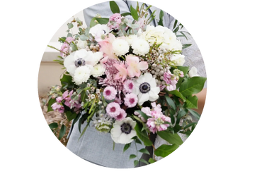 Poppy Anemone flower bouquet with pink and purple flower accents. Payson Temple in Payson, Utah.