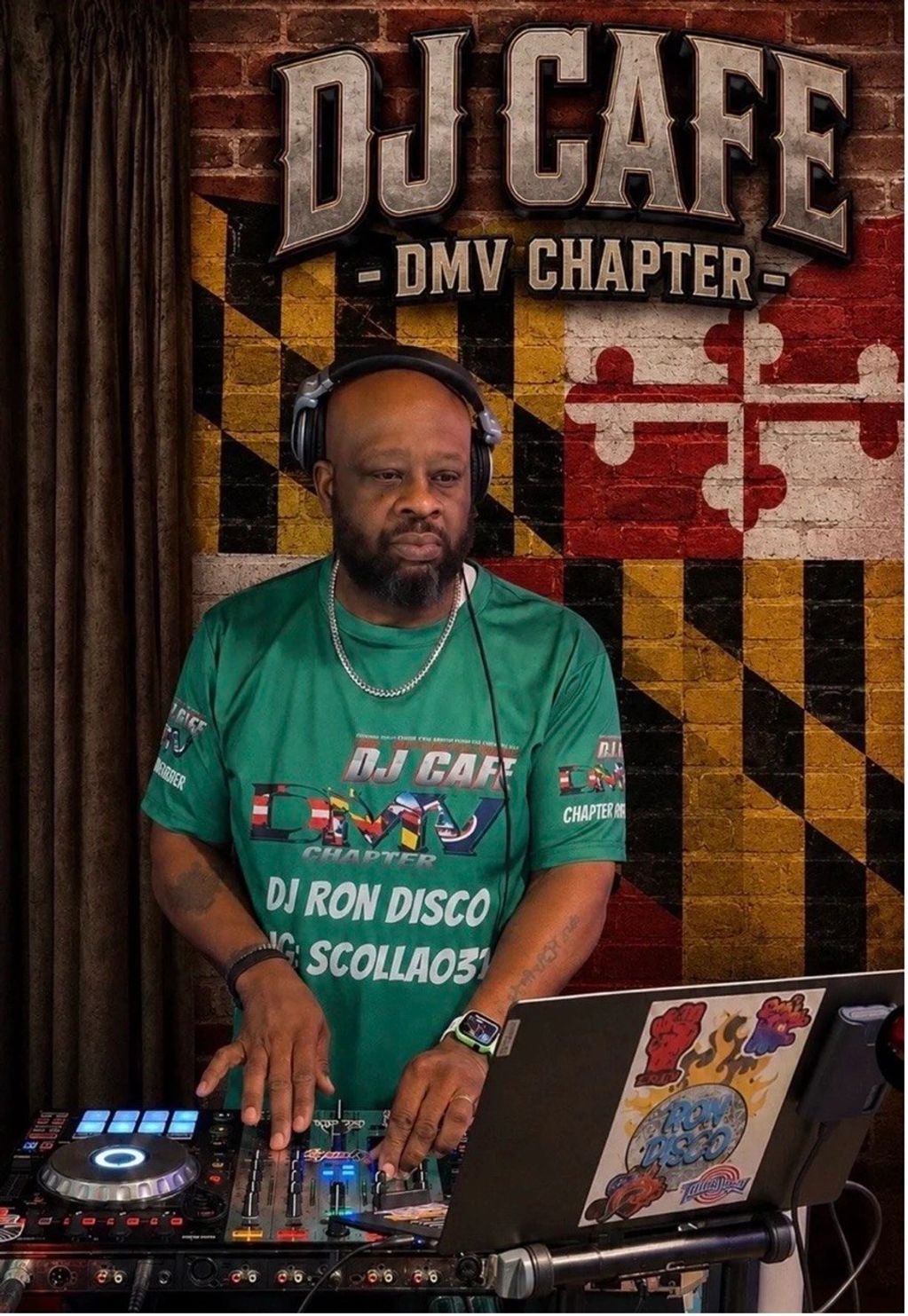 DJ working at a turntable with a Maryland flag backdrop.