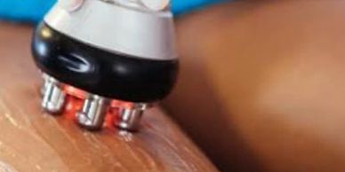 Radio frequency being used on the skin for skin tightening fat cavitation treatment at xora health
