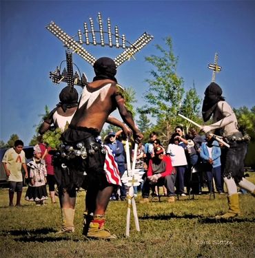 Crown Dancers perform sacred dances for the crowd.
