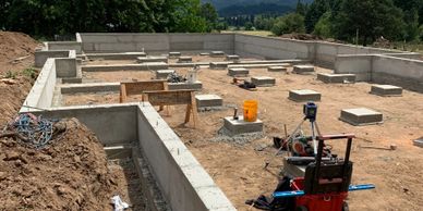 Concrete Foundation & Footing, Concrete work, Quad Construction, Custome home foundation.