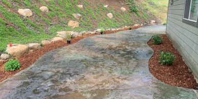 concrete sidewalks, concrete driveway, concrete finish, stained concrete, concrete stamps.