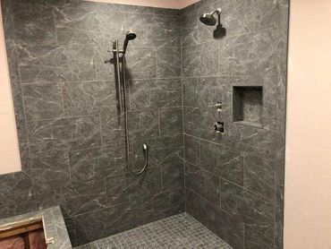Shower remodel, tile work, new faucet, tile shower pan