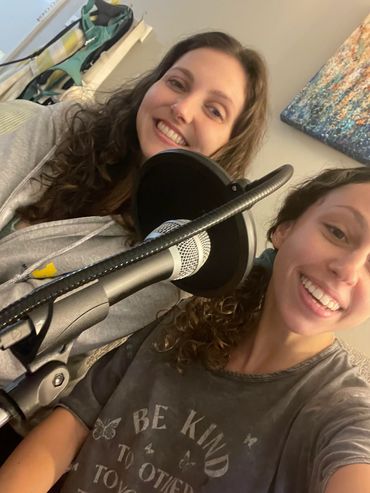 Hosts, Anna and Olivia, preparing to record
