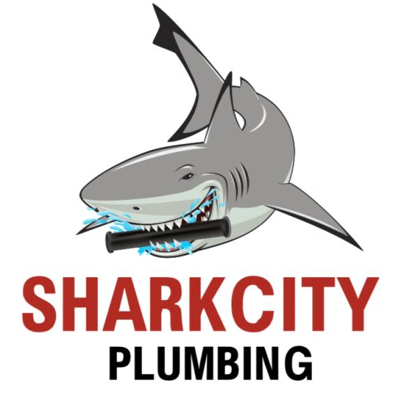 A shark holding a pipe with water splashing, logo for SharkCity Plumbing.