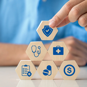 Stacked wooden blocks with healthcare and security icons being arranged.