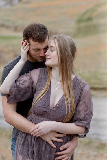 Young couple hugging for photo shoot in Racine, Ohio