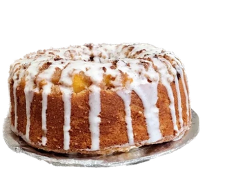 A glazed bundt cake with icing drizzled over the top.